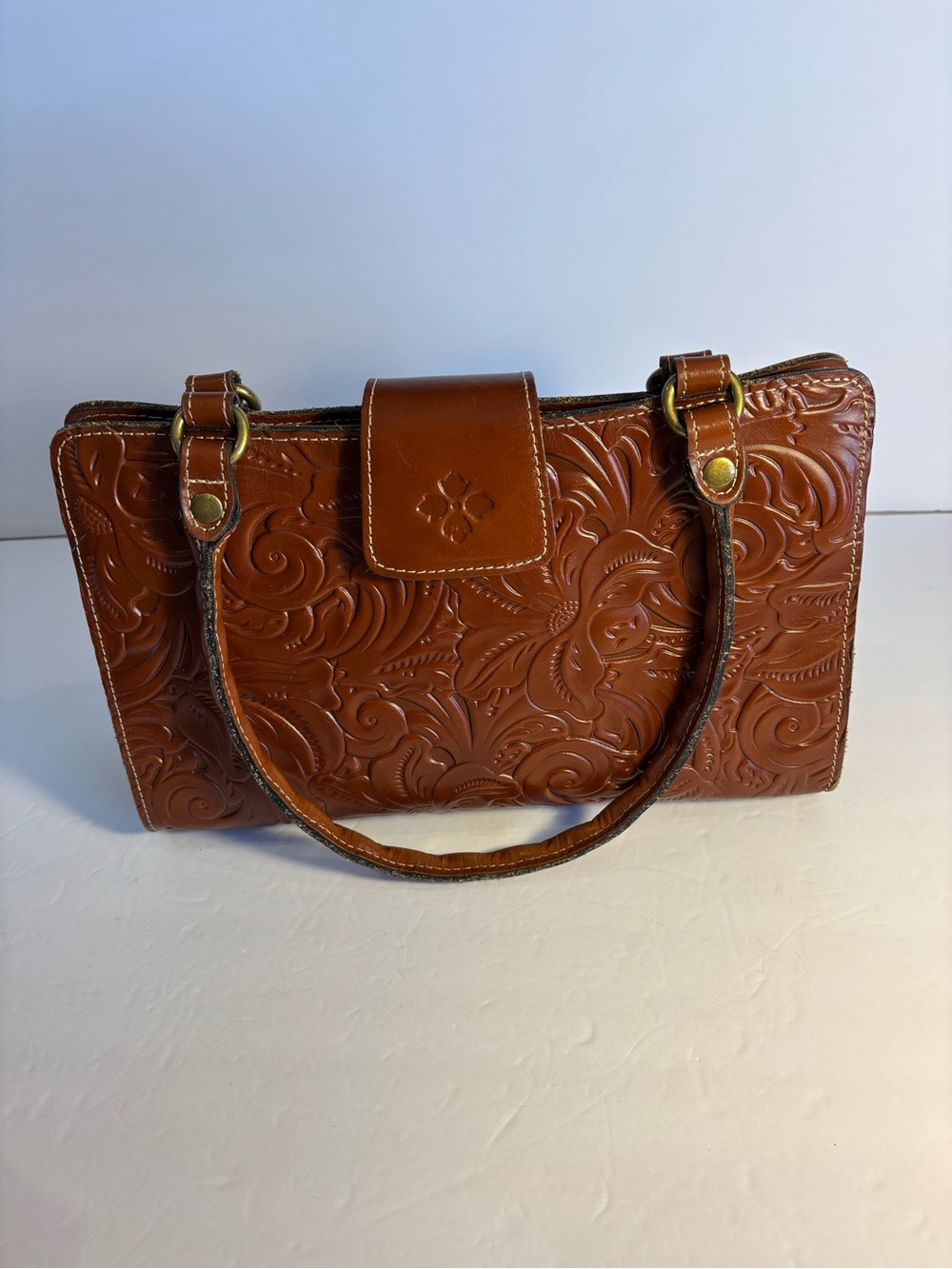 Patricia Nash Rienzo Satchel in the Florence tooled cognac/tan leather design